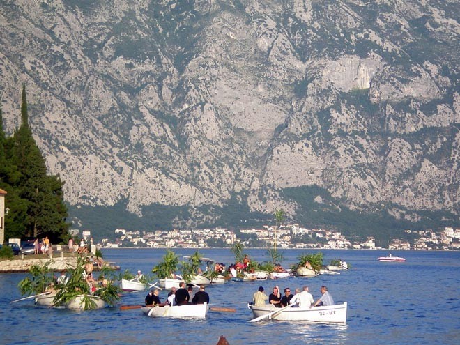Annual festival at Perast making their way out to Our Lady of the Rock © Yacht Balvenie